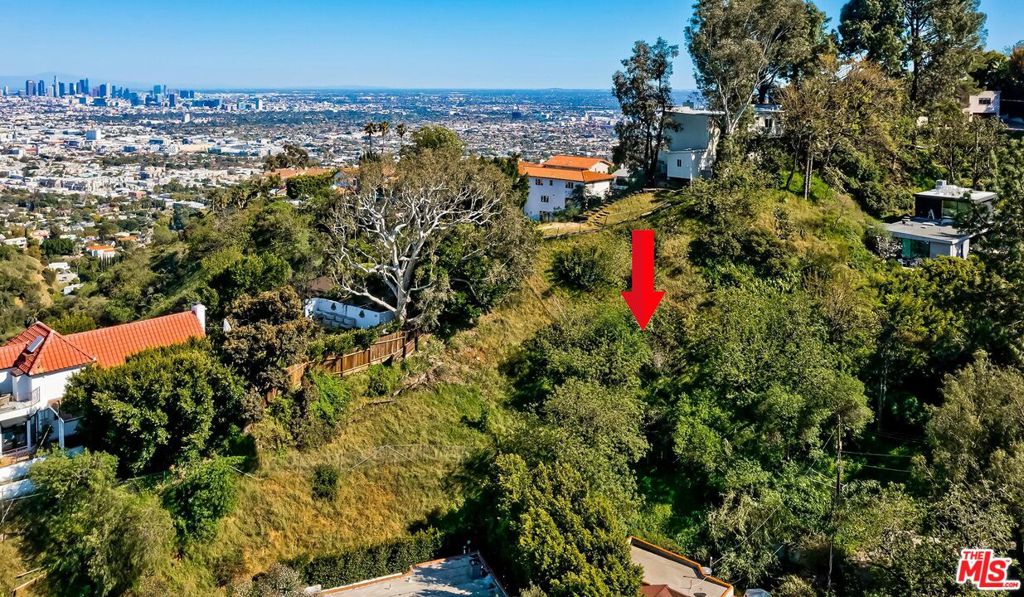 This is a rare development opportunity to build a dream home on a large parcel of land consisting of 3 APNs. Seller has gone to great lengths to provide stunning plans with the sale. Proposed home is a Loft style Modern home with an expansive roof deck featuring outdoor kitchen with Canyon views all privately nestled among the trees. The interiors have the potential to create up to 3 bedrooms, 3 baths, plus and office. Buyer to do and rely on own investigations. This land is sold together "as is" with no representations or warranties by the Administrators of the Estate as to construction permits availability of land use.
