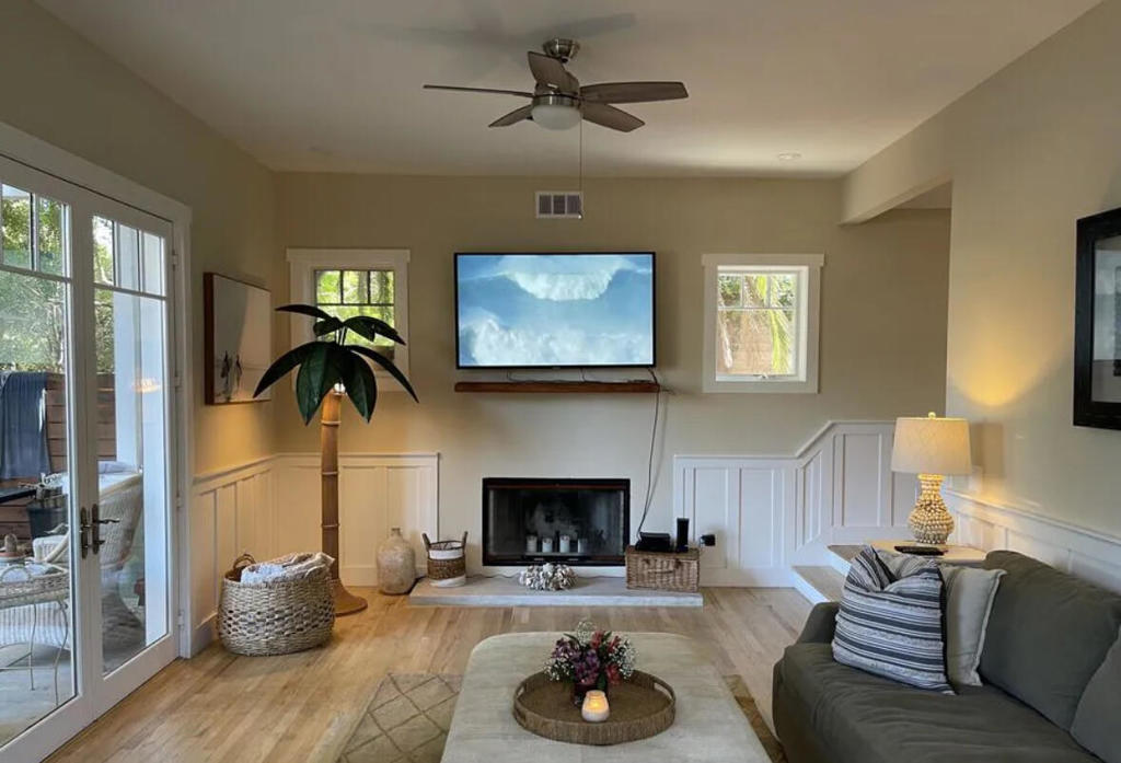 Incredible Opportunity In The Heart Of Venice Beach To Own A Home With Separate Guest House. With 2,478 sq ft of interior living space, this 4 bedroom and 3 bathroom home is blocks away from Abbott Kinney and a brief walk from the beach. With contemporary upgrades throughout, this home features beautiful new white oak engineered wood floors, new paint throughout, newly designer finished master bathroom along with fresh updates in kitchen, high ceilings throughout & a wood burning fireplace in living room. The master suite with fireplace features a private balcony, walk in closet, freshly designed master bathroom with separate tub and dual sinks. The main home with 1,828 sq ft has many additional upgrades which include recessed lighting, double pained windows & a tankless water heater. The guest home is over 600 sq ft. It features kitchenette plus bathroom. Inside Laundry. Two car garage.