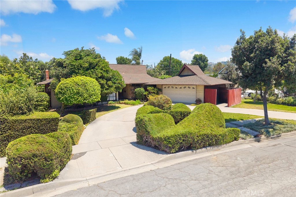 Welcome to this beautifully maintained, spacious single-story home nestled in the heart of Hacienda Heights. Boasting 4 bedrooms and 3 bathrooms, this expansive residence offers approximately 2,465 square feet of well-designed living space on a generous 11,349 square-foot lot.
Step into the oversized family room—an impressive 600 square-foot permitted addition—featuring a cozy gas fireplace and a built-in bar, ideal for relaxing nights in or lively entertaining. The thoughtful layout and quality craftsmanship are evident from the moment you walk through the door.
The charming backyard is your private retreat, complete with a sparkling pool and jacuzzi—perfect for morning coffee, afternoon tea, or weekend gatherings. Manicured landscaping and stunning curb appeal welcome you home, while the spacious backyard provides ample room for summer barbecues, celebrations, and outdoor living. Located in a highly desirable neighborhood, this property offers convenient access to local parks, shopping, and major freeways. Whether you're looking to host, relax, or raise a family, this home checks all the boxes. Pride of ownership shines throughout—don’t miss this exceptional opportunity!