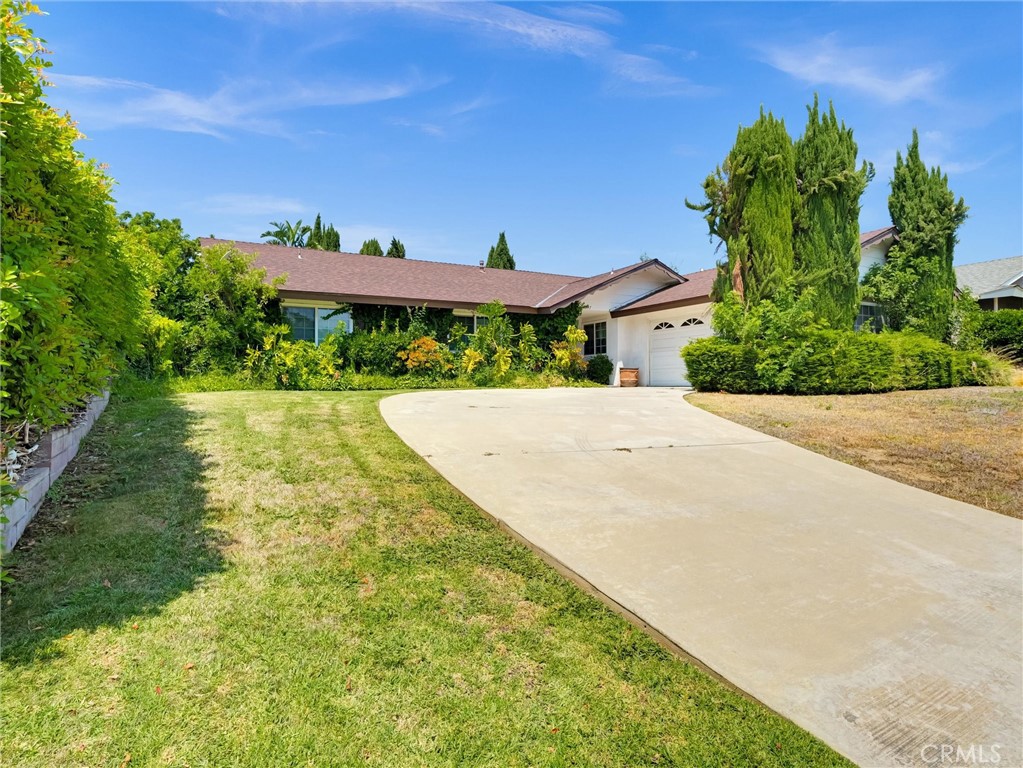 Bring your family home to this roomy and private single-story beauty, with recently remodeled kitchen, windows, HVAC, and plank flooring throughout. The back yard is a vibrant garden oasis, ready for quiet summer days in a peaceful retreat. Washer/dryer and water heater are located in the oversized 2-car garage. Don't miss it!
