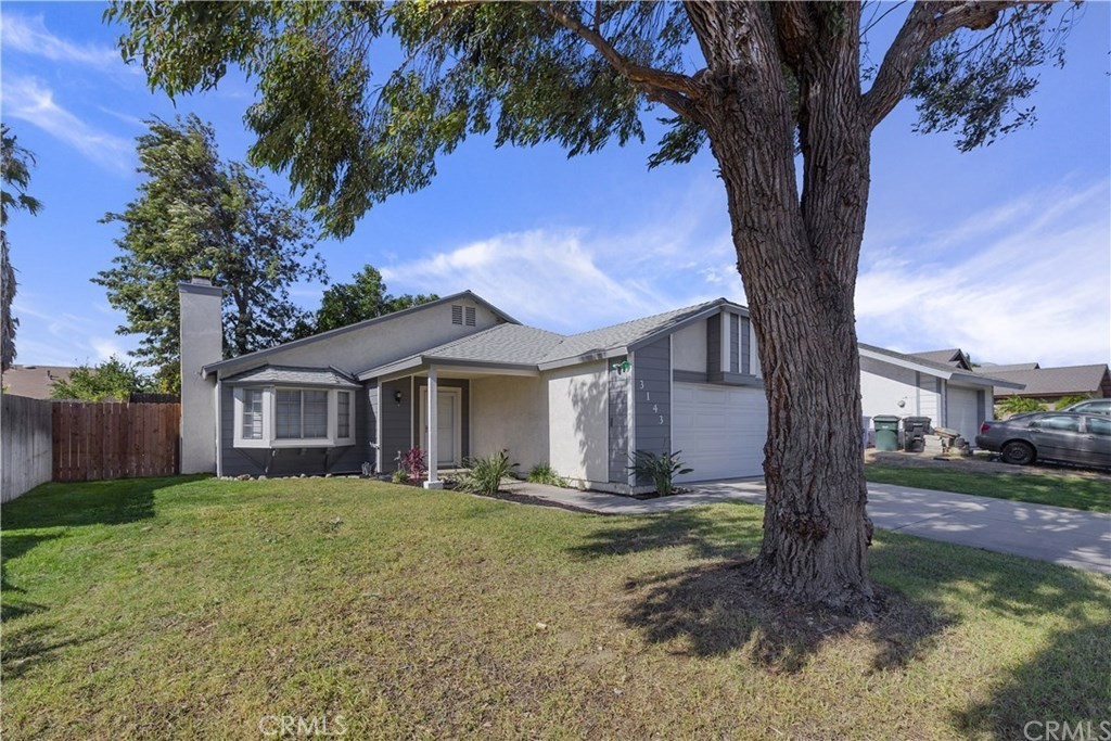 LOCATION, LOCATION, LOCATION. Near the 60, 15 and 91 freeways. Perfect for commuters. This home features high ceilings, granite counters tops, lots of updates, barn doors, cozy fireplace, a new enclosed patio currently being used as an office, ceiling fans throughout. This two bedroom, two bath also has a large BONUS room. And the master has a private bath with private entrance/exit to the back yard. Beautiful mature trees in this spacious back yard with several entertaining areas. Nice community park, walking distance with ball field, walking trail and playground. NO HOA's. Motivated seller. REO. Must SEE. Get it before it's GONE!!