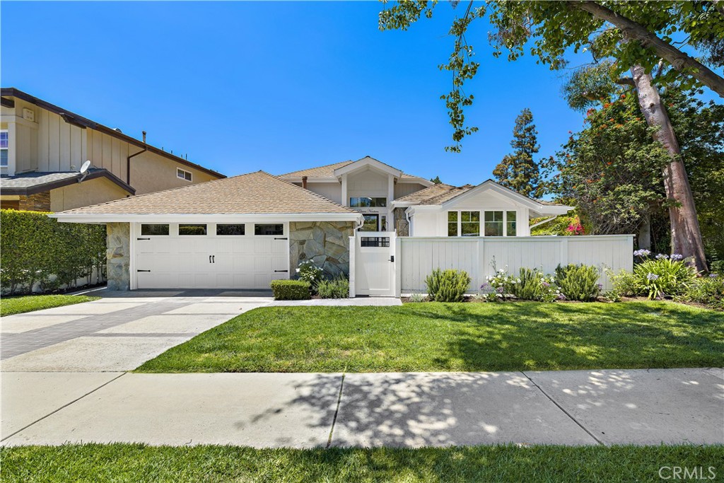 Charming Single-Story Home located in Prestigious Dover Shores, tucked away on a spacious corner lot this stunning home greets you with an elegant foyer, setting the tone for the sophistication found throughout. Featuring high vaulted ceilings and an open-concept design, the home seamlessly blends warmth and modern elegance. Expansive windows flood the interior with natural light, showcasing views of the newly landscaped front & backyard that includes a tranquil patio adorned with multiple water fountains, a sparkling swimming pool and spa, perfect for quiet relaxation or outdoor entertaining. The newly remodeled kitchen is a true culinary haven, where elegance meets functionality. Custom cabinetry offers abundant storage, while dramatic wood-beamed ceilings add warmth and character to the space. A large center island serves as the heart of the kitchen, ideal for meal preparation and gatherings. Premium Viking stainless steel appliances, complemented by luxurious Italian Carrera marble countertops, elevate both style and performance. A cozy breakfast nook area overlooks the serene private patio, complete with potted flowers and gentle water fountains—creating a peaceful retreat to enjoy your morning coffee. A formal dining area, located just off the kitchen, offers an elegant setting for special occasions and intimate dinners. The adjoining family room is designed with both comfort and style in mind, featuring a cozy fireplace and a custom-built bar, ideal for entertaining. The master suite offers a tranquil retreat, w/ vaulted ceilings and walk-in closet. The newly remodeled master bathroom is a luxurious spa-inspired sanctuary with quartz countertops, custom lighting, walk-in shower and a freestanding soaking tub.
The home also features three additional bedrooms, powder room w/Carrera marble countertops & guest bathroom w/ double sinks, quartz countertops & custom lighting. A convenient walk-in laundry room, complete with a sink area. Throughout, you'll find gorgeous hardwood oak flooring, upgraded Italian tiles, and all-new windows and doors, adding an extra layer of sophistication and modern convenience. Located in the highly desirable Dover Shores neighborhood of Newport Beach, this home is perfectly situated with easy access to the Castaways Trail and walking distance from the Back Bay, pristine beaches, Fashion Island, 17th st shopping /restaurants, top-rated schools, and world-class golf courses.