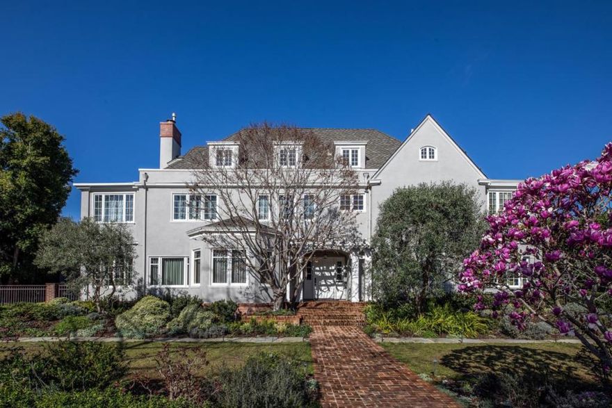 Once in a generation opportunity, exquisite and rare property with tennis court just blocks to downtown. Completely transformed by top builder, architect and designer-this home has it all including elegance, grace, and functionality. All in a private setting with stunning landscaped grounds. Extremely rare, more than 1/2 acre this 6 bedrooms 4 full and 2 half baths home spans over three above ground levels. Refined mill-work and hardwood floors with grand scale formal entertaining spaces. Main floor includes formal living and dining rooms, dedicated office plus two sun rooms for flexible use as well as an impressive great room with beautifully appointed kitchen, mud room, eat in breakfast room and family room overlooking the yard. The primary suite with sitting room and luxurious bath and walk-in closet is on the second level along with 3 bedrooms each with direct access to a bath. Third floor consists of two bedrooms, bath and an impressive recreation room, with cathedral ceiling and neighborhood views. The backyard has a sparkling pool, spa with in-ground cover and newer garage with adjacent pool house, full bath, fireplace, expansive patios and tennis court. All within blocks to downtown, shops, restaurants and Stanford University. A must see and extremely rare opportunity.