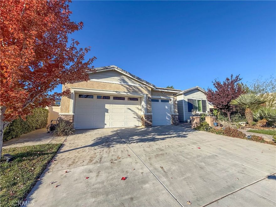 Welcome home to 1444 Worland, a highly enticing single level residence offering over 2000 square feet of well designed living space on an expansive 14000 plus square foot lot. This three bedroom three bath home features a spacious primary suite designed for comfort and privacy, along with a dedicated office and a bonus room that add exceptional flexibility for work, play, or guests. A three car garage and an upstairs loft provide over 400 additional square feet of versatile living space, ideal for a media room or creative retreat. The kitchen is thoughtfully designed for both everyday living and entertaining, featuring granite countertops, an oversized island, and tile and luxury vinyl plank flooring throughout the kitchen and living spaces, with a dining area directly adjacent to the kitchen that creates a natural flow for meals and gatherings. The refrigerator, microwave, washer, and dryer are all included for added convenience. Outdoors, the massive backyard creates an exceptional setting for entertaining, complete with a large patio, a mature Meyer lemon tree, and ample room to enjoy true outdoor living. Ideally located adjacent to Starlight Elementary, this home blends space, functionality, and an inviting atmosphere perfect for relaxed living and memorable moments.