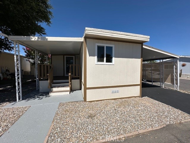 55+ Beautiful, Securely Gated, Community of Casa Del Rey. WOW you must show your qualified buyers this one. This cute mobile home has been completely remodeled with a bathroom and laundry added. It is a 2 bedroom 2 bathroom , T-1-11 on the outside of the mobile home and the skirting. Custom handrails on the Front Porch with Trex deck on the porch and stairs. Back porch stairs has indoor outdoor carpeting. All dual pane vinyl windows.
All new cabinets throughout, all new flooring throughout, new lighting fixtures, plumbing, sinks, toilets, showers and tubs. All new countertops throughout. New Air Conditioning and Heating. New Water Heater. This home is as clean and new as it gets. Custom glass front door. Pop Out in the living room which creates a large living room . This home is as sweet as it gets... Move-in Ready.
Park has two clubhouses, swimming pools, enclosed jacuzzi, TV room, conference room, exercise room, barbecue area and more. Affordable park rent of $689.