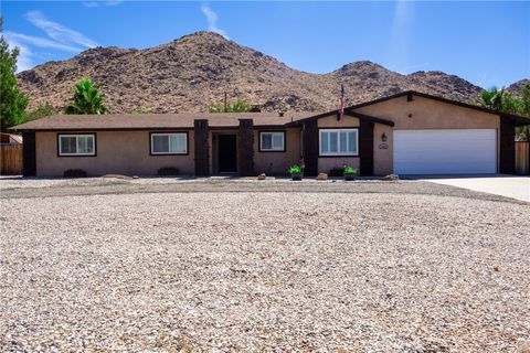 Photo of 16027 Mandan Road, Apple Valley, CA 92307 (MLS # CV25189273)