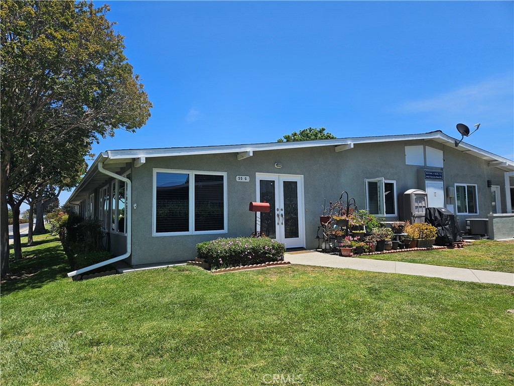 Fully extended conner home in excellent condition, open floor plan a double-door entry to living room, large double-pane windows on both walls bring in abundant sunlight and ocean breezes, Premium solid wood flooring throughout, two storage closets for storing shoes and other belongings, and smooth ceilings with recesses lighting enhance the clean and modern look throughout. Master bedroom: large walk-in closet, huge double-pane window, wall adjoining the neighboring unit is Sound-Insulated. Kitchen: opens to the living room has a skylight, quartz countertop with an oversized single-basin sink for greater functionality. Second bedroom: generously sized. Bathroom: quartz countertop, washer/dryer, a skylight for natural light and airflow. Expansive windows in the living room and master bedroom overlook two stunning trees provide refreshing green shade in spring and summer, broom with vivid deep pink flowers from late summer through fall creating a beautiful picturesque view. Amenities: 9-hole par-3 golf course, Gym, Swimming pool, Jacuzzi, Shuffle Board, Pickle, Bocce Ball courts, Table tennis...six clubhouses featuring an art room, crafts, sewing, woodshops, etc... with over 200 social clubs to join. Amphitheater, Post office, Library, Pharmacy, Full-Service Health Care Center, and much more... 24-hour security guard and gated entrance. Carport #35 space #19.