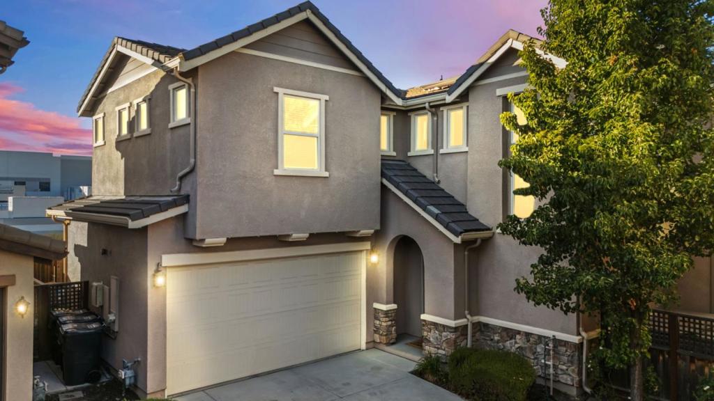 Nestled in the highly sought after Vineyard Crossing community, this stunning Reserve model is a rare find and one of the largest floor plans on one of the largest lots in the entire development. Tucked away in a peaceful corner, 322 Misty Circle offers 5 bedrooms, 3 full bathrooms, and 2,270 square feet of beautifully designed living space, this exceptional home checks every box. With a full bedroom and full bath on the main level, its perfect for multigenerational living, out-of-town guests, or a private home office. This home offers the largest yard in the community with no rear neighbor, giving you a true sense of peace, space, and privacy, ideal for entertaining, gardening, or simply relaxing in your own backyard retreat. The train line behind the home is non-operating. The open concept layout is bathed in natural light, with a seamless flow between living, dining, and kitchen spaces. High ceilings, large windows, and well-thought out design details make this home both stylish and functional. Youll also enjoy the convenience of a two car garage, EV charging, tankless water heater, and energy-efficient features throughout. You do not want to miss out on this RARE home in one of Livermores most desirable pockets.