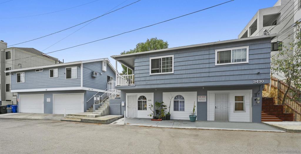 A+ Hillcrest / North Park Investment Opportunity! 4 Existing 2BR units with garages. 7 PERMIT READY UNITS. Owner has spent approx. $300k with architects, engineers & the city to deliver permit ready development. Located on a spacious 9,400+ SF lot with dual access from Georgia Street (92103) and Wilshire Terrace (92104). The existing 4 units are oversized 2-bedroom units—each featuring large private patios, in-unit washer/dryers, and value-add potential. The site is located in highly desirable North Park / Hillcrest with sweeping views, just one block from Balboa Park. Near trendy restaurants, bars, and brand-new high-end condos, this is a rare chance to invest in one of San Diego’s most vibrant and walkable neighborhoods, with strong rental demand and long-term upside.