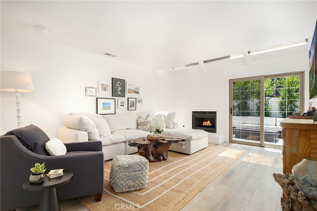 Eastside Costa Mesa 4-Bedroom! Both spacious and stylish 4-bedroom, 2.5-bath end-unit townhome is tucked into one of the most coveted corners of Eastside Costa Mesa - arguably the best side. With an attached 2-car garage, guest parking, and extra yard space thanks to the end location, this one brings the space, light, and lifestyle you’ve been waiting for.Enjoy the double door entrance, high ceilings on both floors, tons of natural light, fresh updates throughout, and popular layout. The remodeled kitchen features updated countertops, there’s a newly renovated first-floor guest bath, & updated full bath upstairs, new fireplace wall, skylights, a new central heating unit, and even a new patio setup! Laundry is smartly tucked into the downstairs guest bath for convenience. You’ll be walking distance to it all—golf, NEWPORT Back Bay, Irvine Ranch Market, Coffee Dose, Starbucks, Tacos Madre, and more. Top Costa Mesa schools, easy freeway access, and the OC Fairgrounds just across the way. If you know Eastside Costa Mesa, you know this is the one.