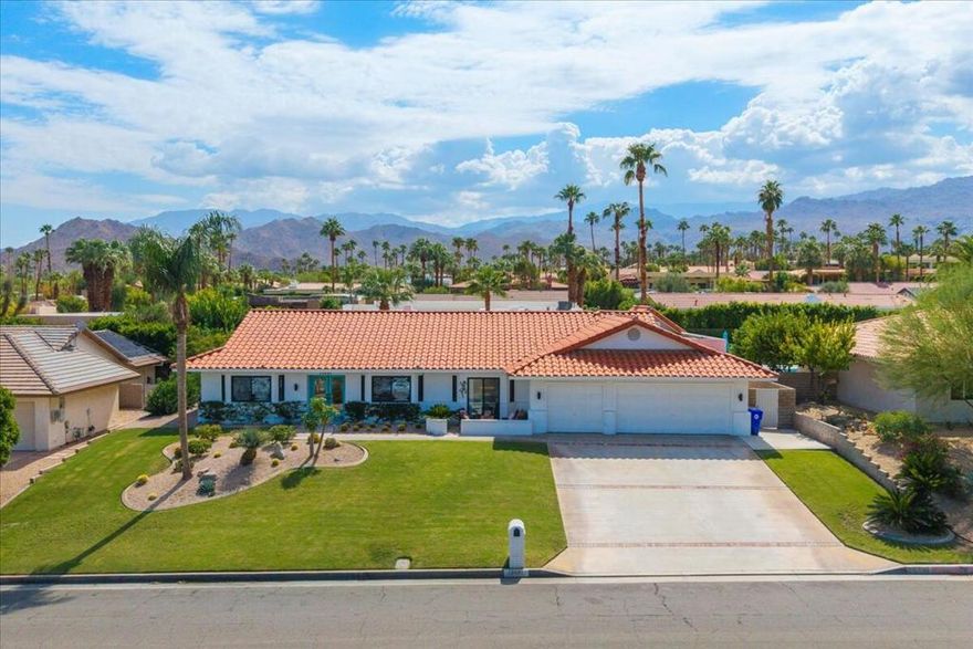 This South Palm Desert residence is truly turnkey--fully furnished, professionally decorated in 2023, and enhanced with extensive updates completed the same year. Every space reflects a modern, stylish design and a focus on comfort and livability.The main home features 3 bedrooms and 3 bathrooms with an open floor plan and vaulted ceilings. The newly renovated kitchen showcases quartz waterfall counters, a striking tile backsplash, breakfast bar, and dry bar. The expansive primary suite includes a generous walk-in closet, a spa-inspired bathroom, and direct access to the saltwater pool--perfect for morning swims or evening relaxation.A private attached guest house adds exceptional versatility, offering its own bedroom, bathroom, full kitchen, living/dining area, washer/dryer, and dual ductless mini-split A/C systems--ideal for hosting guests or as an income opportunity.Extensive updates completed in 2023 include all-new appliances, new window coverings, a high-efficiency A/C unit, new furnace, new water heater, and a five-camera security system. Outdoors, the professionally landscaped grounds are enhanced with upgraded sprinklers, a new misting system, and automated pool equipment. The backyard is a true retreat, highlighted by a sparkling saltwater pool and a hand-painted mural that adds a unique artistic touch.Located just minutes from El Paseo's premier shopping, dining, golf, and hiking, this South Palm Desert residence combines style, function, and location--delivering the ultimate desert lifestyle.