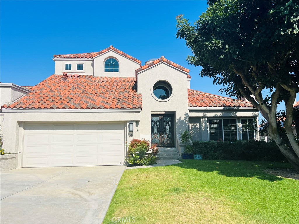 Ocean Views beautiful home. Panoramic views of Saddleback Mountain and City Lights that stretch across the valley all the way to Pacific Ocean. One of the largest grassy front yard in this private 24 hour gate-guarded community of Laguna Sur. Newly paint and new flooring. This luxury home is light and airy with an open floor plan that opens onto Verandas at each level. Main level living includes dramatic entry, soaring ceilings, formal dining and living rooms and remodeled kitchen that opens to the family room. This unique and desirable floor plan dedicates the Master Suite and Sitting Area at the top level providing a true retreat. The lower floor for family and guests features a fabulous game room with wet bar and two bedrooms. This wonderful beach close community has 24 hour manned gates, two large pools, spa, gym, clubhouse, hiking trails, picnic park. Close to the Beach, Shopping, award-winning schools, restaurants and more...