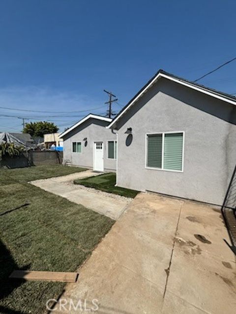 Photo of 1205 W 84th, Los Angeles, CA 90044 (MLS # IN26049453)