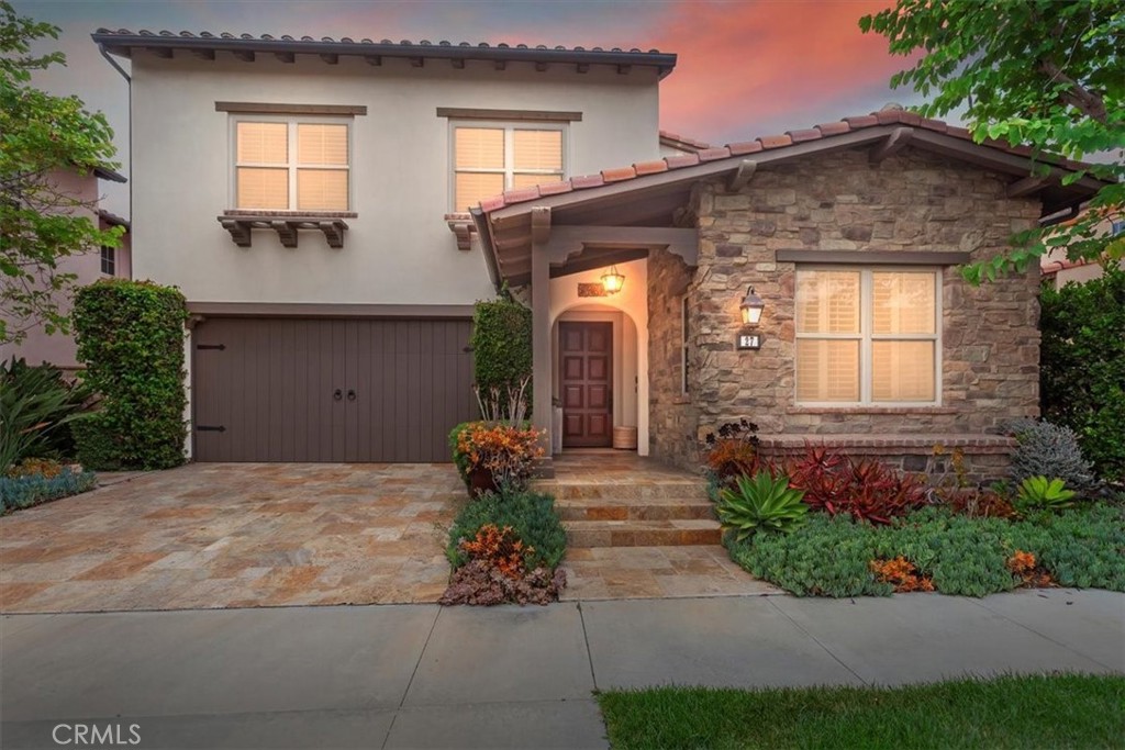 Welcome to this Elegant and Highly Upgraded 5-Bedroom, 4-Bathroom Villa in the Coveted Woodbury Village. This stunning residence showcases the most popular “Carmel Plan 3”, featuring a highly desirable open-concept layout and premium-quality upgrades throughout.
Upon entry, you’ll find a private guest bedroom on the main floor, complete with a full bath—perfect for visitors or multi-generational living. At the heart of the home is a spacious great room with a cozy fireplace, seamlessly flowing into the light-filled dining area/California room and the gourmet kitchen. The kitchen is a chef’s dream with granite countertops, stainless steel appliances, custom cabinetry, a generous walk-in pantry, and an expansive center island ideal for entertaining.
Step outside into your own tranquil retreat—an elegant backyard adorned with a soothing fountain and lush, manicured landscaping.
Upstairs, the luxurious Master Suite features a spa-inspired bathroom with dual vanities, a soaking tub, a large walk-in shower with glass enclosure, and a roomy walk-in closet. Two additional secondary bedrooms offer comfort and space, accompanied by two more bathrooms and a versatile bonus room that can serve as a fifth bedroom, media room, or home office. A large laundry room with sink and linen storage completes the upper level.
Woodbury Village offers resort-style amenities including a private clubhouse, 7 pools, multiple spas, sports courts, playgrounds, 16 parks, and scenic picnic areas. Conveniently located near the award-winning Jeffrey Trail Middle School, and just minutes from the Woodbury Town Center and Cypress Village Shopping Center.