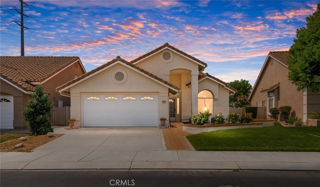 Beautiful Single-Story Home with Breathtaking Views in Premier 55+ Community. Welcome to this stunning 2-bedroom, 2-bathroom single-story home, perfectly located in a vibrant 55+ community packed with resort-style amenities. From the moment you arrive, the meticulously manicured curb appeal sets the tone for the beauty that awaits inside. Step through the front door to find warm laminate wood flooring, elegant tile, and soaring high ceilings that create a bright, open feel. The spacious layout features both a formal living area and a separate family room—perfect for relaxing or entertaining. The gorgeous primary suite includes a dual-sink vanity, a generous walk-in closet, and plenty of natural light. The additional bedroom and full bath are equally spacious—ideal for guests or a comfortable home office. Step outside to your private backyard retreat, featuring a brand-new, oversized aluminum patio where you can enjoy sweeping views of the valley—perfect for morning coffee or evening sunsets. Residents enjoy access to an impressive list of amenities including breathtaking golf courses, a sparkling pool, clubhouse, auditorium, restaurant, bar, and much more. This is more than a home—it’s a lifestyle. Don’t miss your chance to experience it. Schedule your private showing today!