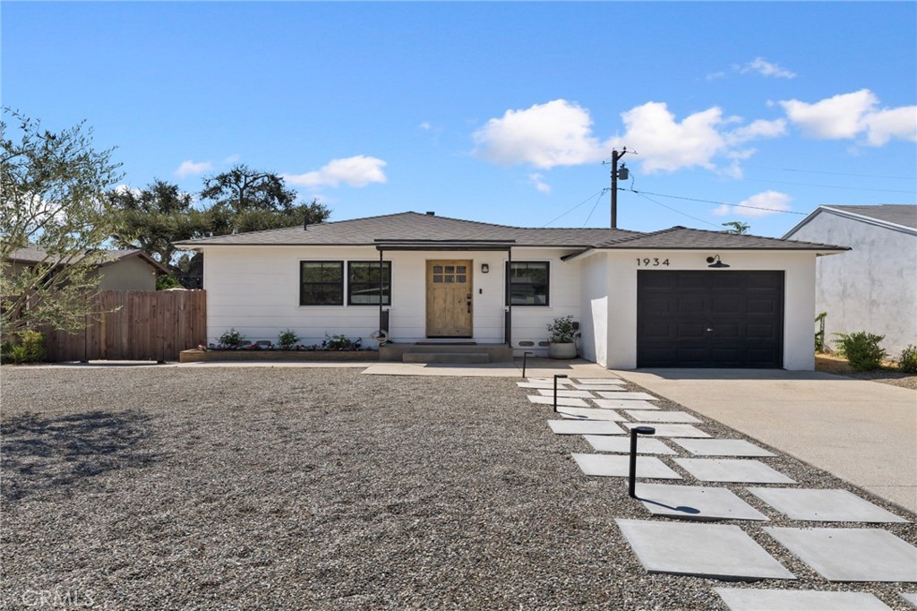 Set against the majestic backdrop of the San Gabriel Mountains, this charming single-family residence seamlessly combines modern convenience with scenic charm. Situated on a spacious lot, the home features a thoughtfully updated 1,125 sq. ft. floor plan with three generous bedrooms and one well-appointed bathroom. The updated kitchen showcases modern cabinetry, stainless steel appliances, ample counter space, and a thoughtfully designed layout that blends style with everyday convenience. Custom-built hallway cabinetry adds function and style, while the primary bedroom is anchored by a cozy fireplace, creating a warm retreat. Recent upgrades include a newer roof, dual-pane windows, and central heating and air conditioning, which provide both comfort and peace of mind. The low-maintenance front yard and the expansive backyard offers a versatile space ideal for entertaining, play, or gardening. Perfectly positioned just two blocks from Duarte Recreational Trail and Royal Oaks STEAM Academy, the home also enjoys close proximity to parks, golf courses, and an array of shopping and dining options. For commuters, easy access to nearby freeways and the Duarte/City of Hope Metro Link station ensures added convenience.