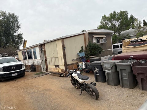 Photo of 25105 Avenida Valencia, Homeland, CA 92548 (MLS # IV26225079)