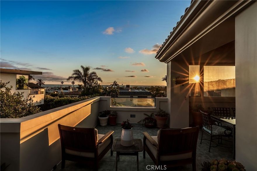 Experience elevated coastal living with panoramic ocean views in this beautifully crafted 3,332 sq ft traditional home, nestled in the highly sought-after Hill Section of Manhattan Beach. Ideally located with just a short stroll to the scenic greenbelt, downtown shops and dining, and the lively Manhattan Beach scene.



Soak in sweeping views from the formal living room, kitchen, family room, and expansive wraparound back deck—perfect for relaxing or entertaining. The chef’s kitchen is equipped with granite countertops, custom cabinetry, two sinks, a commercial-grade range, and French doors that open to a private, wind-sheltered patio ideal for alfresco meals and weekend barbecues. The adjacent family room features a cozy fireplace and custom-built-ins, while a separate formal dining room and a second living room with ocean-view balcony and fireplace add warmth and flexibility. A powder bath and small office complete the upstairs.



Downstairs, the spacious primary suite includes a jetted tub, walk-in shower, dual vanities, and walk-in closet, along with a private office that opens to the backyard for a breath of fresh air while working from home. A second ensuite bedroom, two additional bedrooms with a Jack-and-Jill bath, laundry room with utility sink, and direct-access two-car garage complete the lower level.



Additional highlights include hardwood flooring, dual-pane windows, and thoughtful custom details throughout. Property was designed and equipped to be wheelchair accessible. All just minutes from award-winning schools, boutique shopping, fine dining, and the beach—with easy access to LAX. *Some photos have been virtually staged.*