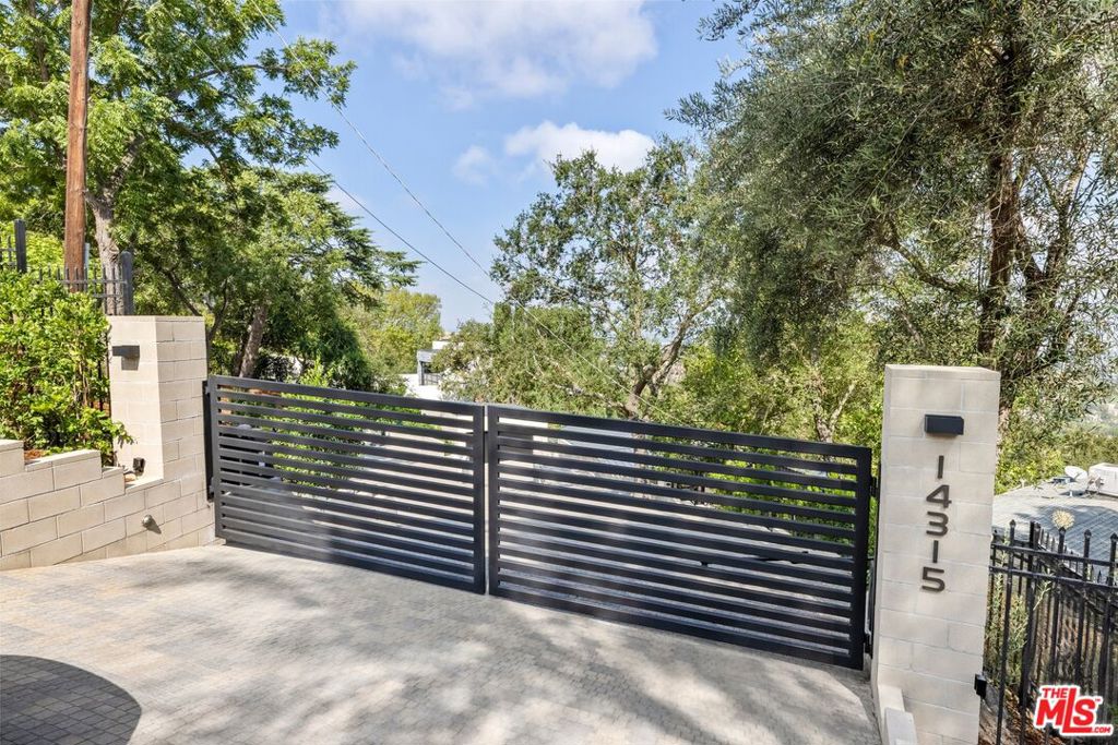 Gated! Completely renovated with amazing views of the mountains and and greenery. *Down a long private driveway *Open floor plan *Tons of natural light *Sliding doors to a spacious outdoor backyard with views *Kitchen with top of the line appliances *Spacious bedrooms *Easy access to the Westside and the Valley *Seconds from Glen Center with gourmet grocery store, the iconic Deli and Vibrato Jazz Club. Nothing not to love!