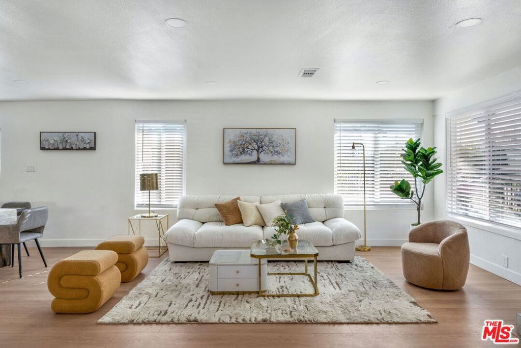 Photo of 5832 6th Avenue, Los Angeles, CA 90043 (MLS # 25625187)