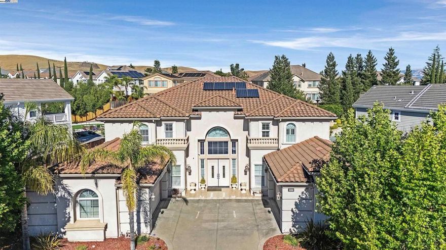 Luxury and location meet at 6013 Kingsmill Terrace, nestled in the gated Pinnacle Ridge enclave of Dublin Ranch. This exquisite Toll Brothers estate features 5 bedrooms, 5.5 bathrooms, and a grand 5,417 sq ft open-concept design. The interior boasts soaring ceilings, elegant finishes, and formal and casual living spaces. Outdoors, a private oasis awaits with a sparkling pool and spacious patio, perfect for entertaining on the expansive 15,210 sq ft (.35 acre) lot. Zoned for top-rated Green Elementary School, Fallon Middle School, and Dublin and Emerald Green High Schools, and backed by HOA perks including gate access, community pool, and tennis courts. Offered As-Is—an exceptional opportunity to personalize one of Dublin’s most prestigious homes.