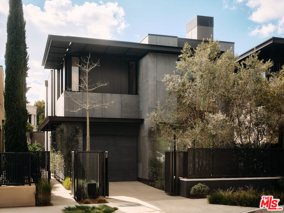 Garden House. Olson Kundig. Nestled in the heart of West Hollywood, 8910 Rosewood Avenue embodies luxury living, where resort-style amenities merge seamlessly with architectural brilliance. This remarkable residence is part of an exclusive collection of eight signature homes designed by the world-renowned Olson Kundig, each offering a distinct material palette and a truly unique living experience. Garden House is a masterpiece of lightness and fluidity, thoughtfully divided into north and south zones to create a dynamic spatial experience. The 3,067-square-foot main residence features three bedrooms and three-and-a-half bathrooms, complemented by an additional studio house with its own bathroom. Entering through the side, guests are welcomed into a harmonious interior progression that effortlessly connects both zones. At the heart of the home, a grand double-height central space and an inviting fireplace in the living room unify the interiors, enhancing the sense of warmth and openness. True to its name, Garden House epitomizes indoor-outdoor living, seamlessly integrating elegant interiors with serene outdoor spaces. Multi-panel operable doors in the front living and rear dining rooms invite effortless transitions between indoor comfort and outdoor hospitality. A private garden sanctuary awaits, complete with a tranquil plunge pooloffering a retreat of unparalleled serenity. Residents of this signature collection enjoy a perfect balance of individuality, privacy, and world-class amenities. As part of Olson Kundig's visionary development at 8899 Beverly Boulevard, hailed as a "Love Letter to Los Angeles", homeowners have access to 24-hour concierge services, a state-of-the-art fitness center, and a lushly landscaped oasis featuring a resort-style pool, spa, custom outdoor kitchen, and the acclaimed on-site restaurant, Stella. Public Report Renewal with CalDRE pending
