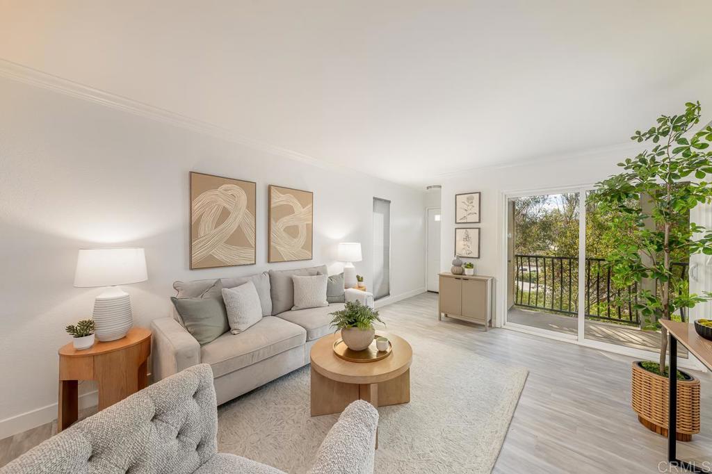 IN-UNIT LAUNDRY. GATED. RECENTLY RENOVATED. ASSIGNED PARKING SPOTS. SAUNA AND COMMUNITY POOL. Welcome to Ash Street, a beautifully updated two-story residence in a secure gated community just minutes from Downtown San Diego. This 2-bedroom, 2-bath home offers 945 square feet of thoughtfully designed living space, blending comfort and convenience with modern upgrades. Inside, you’ll find fresh interior paint, crown molding, new luxury vinyl plank flooring, remodeled bathrooms, and a stylish kitchen featuring granite countertops and stainless steel appliances. In-unit laundry adds practicality, while the absence of an upstairs neighbor provides extra privacy. Residents enjoy two assigned parking spaces along with access to community amenities, including a sparkling pool. The location offers excellent connectivity with quick access to I-15, I-805, and Highway 94, making commuting a breeze. Nearby, you’ll find North Park, Kensington, and Downtown with their vibrant dining, shopping, and nightlife scenes. Schools in the area include Edison Elementary, Wilson Middle, and Hoover High. Parks, coffee shops, and grocery stores are just around the corner, creating the ideal balance of urban living and neighborhood charm.