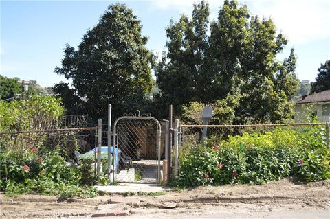 Photo of 5090 Ithaca Ave, Los Angeles, CA 90032 (MLS # DW26043003)