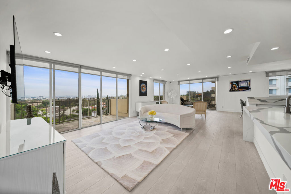 Enjoy unobstructed jetliner views stretching from Beverly Hills to the Hollywood Sign, Miracle Mile, and Downtown Los Angeles. This residence features a beautifully redesigned open-concept kitchen with top-of-the-line appliances, seamlessly connected to an oversized den and dining area. Each of these spaces opens to its own balcony, offering breathtaking panoramic vistas.The primary bedroom includes an ensuite bathroom and generous closet space for comfort and convenience, while the spacious second bedroom also captures captivating city views.Nestled in the heart of Century City, this home is moments from Westfield Mall, movie theaters, and a wide variety of dining options just one block west of Beverly Hills. Rodeo Drive, UCLA, and Cedars-Sinai Medical Center are all within easy reach. Available furnished at $10,000 per month.