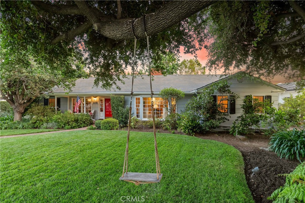 Welcome to 408 Oxford Drive, a rare gem in Arcadia’s coveted Colorado Oaks neighborhood, known as the charming College Streets. This beautifully cared-for California Ranch-style home, cherished by the same family for over 50 years, blends timeless elegance with thoughtful updates and warm family history. The main house offers approximately 2,170 SF of single-level living with 3 bedrooms and 3 baths, all updated in 2019 with Rohl fixtures and new Restoration Hardware lighting. You’ll find a bright living room and a spacious den — each with its own wood-burning fireplace with gas starter — perfect for gathering on cool evenings. The heart of the home is the kitchen, featuring a professional-grade Wolf four-burner gas range with grille, abundant built-ins, and a charming breakfast nook that invites lingering over morning coffee. A separate laundry room adds everyday convenience. Warm hardwood floors, recessed lighting, and custom storage enhance the home’s charm and practicality. Outside, award-winning gardens surround a majestic oak tree admired by neighbors and accented with a sparkling pool, a spacious backyard deck, and garden lighting — ideal for entertaining, relaxing, or enjoying the seasons. A permitted 808 SF detached guest house (built in 1986) offers 2 bedrooms, 1 bath, its own HVAC, hardwood floors, and plentiful built-ins — perfect for extended family, guests, or a home office. Both homes feature new fire-retardant roofs (2025) and countless thoughtful details. Located within the highly regarded Arcadia Unified School District and just minutes from Westfield Santa Anita, Santa Anita Racetrack, dining, shopping, and transportation, this home combines convenience with lifestyle. This isn’t just a home — it’s a story waiting for its next chapter, where neighbors wave from the street, kids laugh on the swing under the oak, and friends gather on the deck or poolside under the stars. Ready to make it yours?