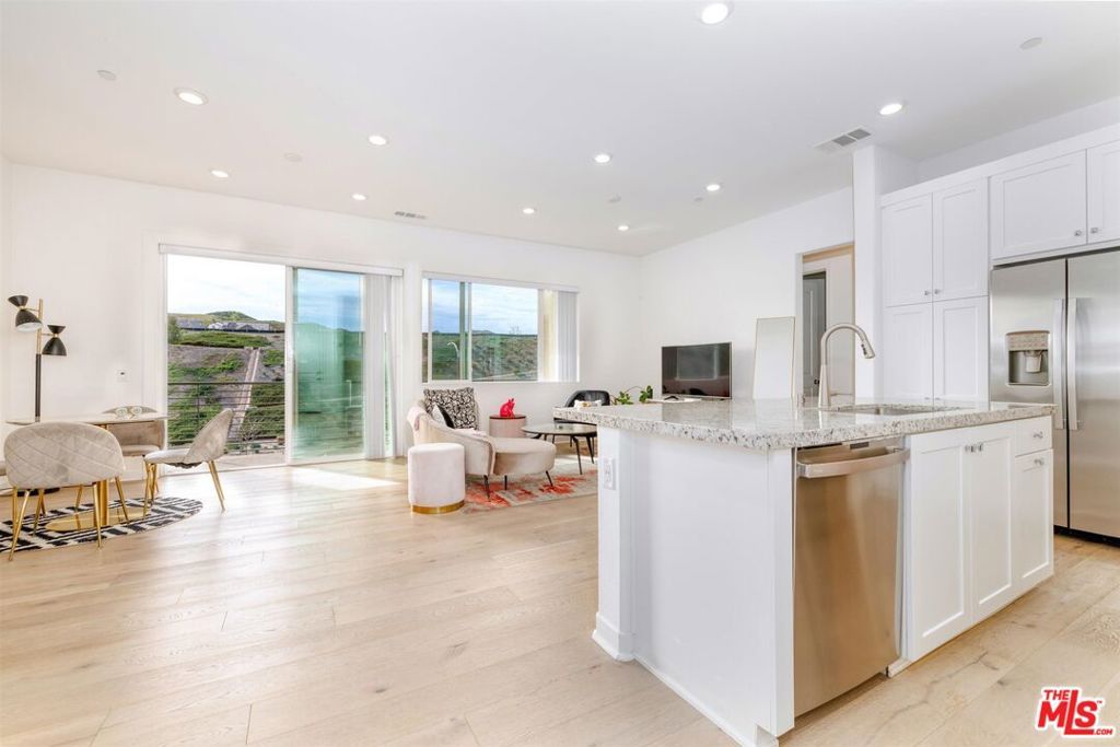 Photo of 27405 Journey Place #305, Valencia, CA 91381 (MLS # 26649885)