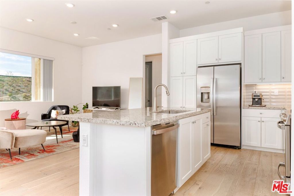 Photo of 27405 Journey Place #305, Valencia, CA 91381 (MLS # 26649885)