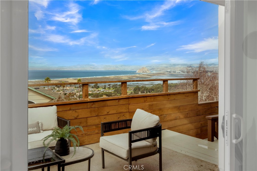 Welcome to 2741 Houston Drive, a modern masterpiece nestled in the prestigious Cabrillo Estates of Los Osos. This fully renovated 3-bedroom, 3-bath home offers a seamless blend of elegance and comfort, all while showcasing breathtaking ocean views from nearly every room.
Step inside to an open-concept living space, thoughtfully designed for both effortless entertaining and tranquil everyday living. The living and dining areas flow seamlessly into the modern chef’s kitchen, premium finishes, new appliances, and sleek countertops invite culinary creativity—all while gazing out at the endless blue horizon.
Downstairs, a generously sized bedroom with a walk-in closet offers ocean views and privacy, ideal for guests or a serene home office. Upstairs, the primary suite redefines luxury with its expansive walk-in closet and awe-inspiring views of Morro Rock, the bay, and the Pacific Ocean. A second upstairs bedroom offers its own charm, ensuring comfort and versatility for family or visitors.
Step onto the wrap-around deck, where the panoramic views are simply unparalleled. From the iconic Morro Rock to the sparkling bay and beyond, this outdoor retreat is an entertainer's dream and a haven for quiet mornings or golden hour gatherings. Every sunset here is a private performance, exclusively for you.
Situated in one of Los Osos’ most sought-after neighborhoods, this home embodies coastal luxury with its elevated design, sophisticated details, and unparalleled views. 2741 Houston Drive isn’t just a home; it’s a lifestyle—offering serenity, sophistication, and the endless beauty of the California coast.
Welcome to your dream home.