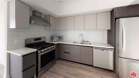 Photo of 5030 Rosewood Avenue #506, Los Angeles, CA 90004 (MLS # 26652179)