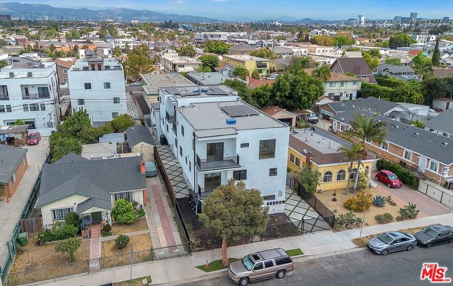 MASTER LEASE-Welcome to 4701 Saturn Street, a gorgeous Non Rent Controlled, High End Brand New 2025 Construction Six Unit with  incredible 180 degree views of Century City, Hollywood Hills and Downtown .The property is located in the ultra trendy Mid-City area, just minutes from Culver City, West Adams and highly desirable area due to its centrality and  walkability to coffee shops, grocery stores like Target, Sprouts, gyms, shops, entertainment district and many trendy restaurants. The building features an attractive unit mix of Four-3 bedrooms 3 baths, 1-5 bedroom 5 baths, and 1- 2 bedroom 2 bath.   Each unit feature's efficient open floor plans with huge bedrooms, walk in closets, massive balconies and all units have a ton of natural light and 180 degree views from Century City and city. All the units features beautiful vinyl flooring with white cabinets, quartz white countertops, and clean sleek modern feel. Moreover, each unit has stainless steel appliances,  washer and dryer in unit, designer Carrara shower tiles and each unit is separately metered. In addition, the luxury building is located just minutes from the Arts District, Helms Bakery, Cumulus which has the famous Whole Foods, Culver City Steps and Ivy Station, which is home to Apple, Amazon Studios, Sony Pictures, HBO, Beats Electronics and many more tech and entertainment companies pouring into the neighborhood.  The strong and ultra hot rent desirability and comps are being achieved in this neighborhood, largely due to the by the surrounding tech hubs, providing high-paying salary jobs. Mid-City overall is a very hot market, its centralized location makes it convenient to get  all neighborhoods such as Miracle Mile, The Grove, West Hollywood, Beverly Hills, Century City, Culver City, Westside/Beach cities or Downtown within minutes and much more. The neighborhood is surrounded brand new construction close by giving a modern, and nice vibrant feel to the area.  TWO WEEKS FREE RENT reduces the rent to $25,491 after the free rent is deducated and factored in, Base rent is $26,600.