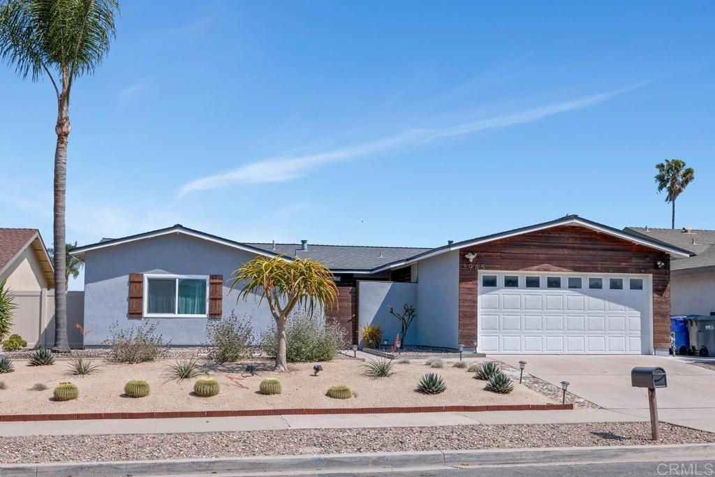 Contemporary Coastal Living in the Heart of South Oceanside! Welcome to this beautifully remodeled and thoughtfully upgraded home designed for Comfort, Efficiency, and Style. From the moment you arrive, the Drought-Tolerant Zero Scape front yard showcases native California Plants—including a striking Dragon AloeTree bringing low-maintenance beauty to your doorstep. The Fully Gated front courtyard offers a sense of privacy and charm bringing you to the Custom Solid Wood Front Door setting the tone for the coastal vibe! Inside, the Open-Concept layout is flooded with natural light, highlighting the custom details that make this Home Truly Special! The Kitchen is a Chef’s Dream with Shaker-Style Cabinets, Poured-in-place Concrete Countertops, a Spacious Pantry for added storage, Brand-New Appliances—including a Refrigerator, Dishwasher, and Oven. A newly installed Ceiling Fan in the Kitchen adds comfort while cooking or entertaining. Beautiful Durable and Stylish Luxury Vinyl Flooring throughout the Living Room, Primary Suite & Second Bed Room! Retreat to the Large Primary Suite & completely redone Primary Bathroom featuring a Stunning New Walk-in Shower and the Dream Closet with Custom Closet Built-ins! Major improvements feature Blown-in Attic Insulation for energy efficiency, and a New Vinyl Fencing for low maintenance and long lasting durability! Step outside to your Large Private backyard Oasis with a Built-in Concrete Fire Pit with Seating area—ideal for cozy evenings and entertaining Guests & Family! Additional upgrades include Custom Built-in Shelving in Primary & Second Bed Room, Ceiling Inlays, Dual-pane Vinyl Windows and Sliding Glass Door, updated Bathroom Vanities, Newer Roof, Custom interior and exterior paint, and Newer Heating System! This home effortlessly blends form and function- Schedule your private showing today this Home won’t last long!
