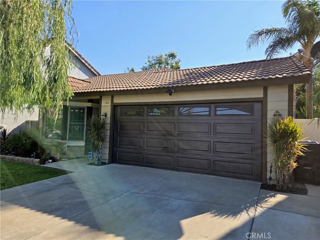 Welcome to 11888 Banana Ave in Fontana – This beautifully home is truly turnkey and ready for you to move in. Thoughtfully updated throughout, it features elegant wood-look tile flooring, plush carpet, and kitchen with granite countertops, stainless steel appliances, a charming garden window, and modern light fixtures. Include dual-pane windows, AC unit, and tasteful finishes that enhance every room. The spacious living room offers a warm brick fireplace, perfect for cozy evenings. Step outside to your private backyard oasis complete with a sparkling pool and relaxing spa—ideal for entertaining or unwinding after a long day. Garage/ Party Room must see. Don’t miss the chance to make this exceptional home yours!