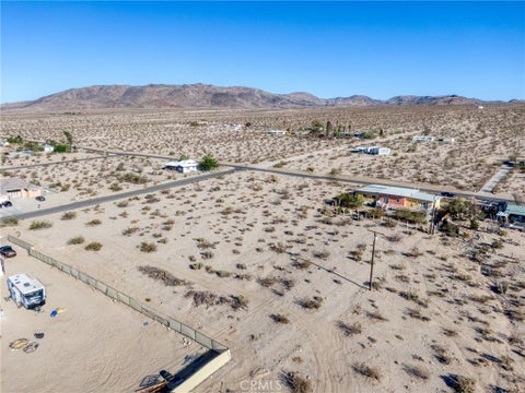 Photo of 7694 Araby Ave AVE, 29 Palms, CA 92277 (MLS # JT26184713)