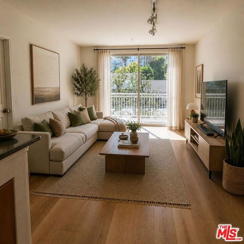Photo of 3740 Santa Rosalia Drive #315, Los Angeles, CA 90008 (MLS # 26988861)