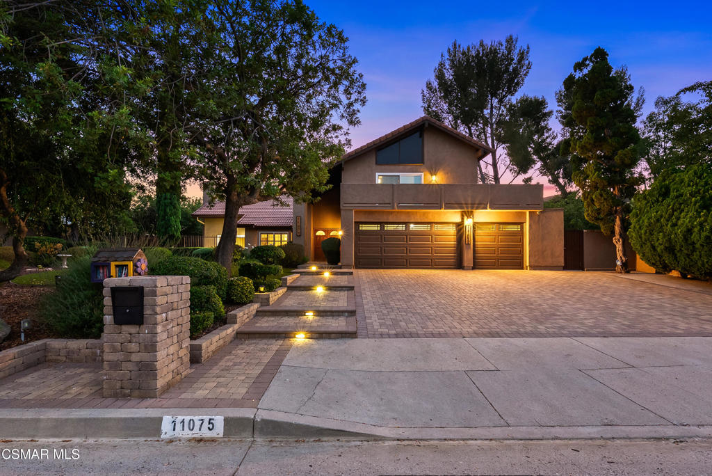 11075 Oso Avenue, a beautifully appointed 4-bedroom, 3-bathroom home tucked away on a quiet, tree-lined street in one of Chatsworth's most desirable neighborhoods. Blending timeless design with modern sophistication, this residence offers an elevated lifestyle filled with comfort, elegance, and thoughtful functionality.Inside, you'll find an airy, light-filled layout with expansive living and dining areas, rich finishes, and a seamless flow perfect for both everyday living and refined entertaining. The chef's kitchen anchors the home with high-end appliances, sleek granite countertops, and custom cabinetry ideal for everything from casual mornings to curated dinner parties. The flexible floor plan includes a rare downstairs en-suite bedroom, perfect for guests, multi-generational living, or a private home office. Upstairs, retreat to the luxurious primary suite, a peaceful sanctuary featuring a spa-inspired bathroom with a soaking tub, walk-in shower, dual vanities, and spacious closets offering the perfect place to unwind. Step outside to a private, beautifully landscaped backyard with mature trees and ample space to bring your outdoor vision to life whether it's a sparkling pool, a lush garden, or al fresco dining under the stars. Additional features include close proximity to scenic trails, parks, equestrian centers, and top-rated schools. 11075 Oso Ave delivers the perfect blend of luxury, location, and lifestyle in one of the Valley's most established and charming communities.