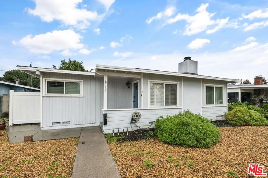 Adorable gem on a tucked away street in Reseda i--Now for sale--(or Lease) Three good sized bedrooms, and a darling updated bath with double vanities --plus beautifully refinished wood floors---and handsome plantation shutters throughout! They keep the house so cool, you may not have to turn on the air conditioning in summer! The open floorplan of the living room and dining area offer a decorative fireplace. There's recessed lighting that will showcase any artwork you want to display. The kitchen includes gas range, farm house sink, microwave, refrigerator, and a cozy breakfast nook area. The laundry area is adjacent with a washer and dryer included! Step outside to the grassy backyard--for relaxing or maybe even a game of croquet....? BIG bonus: owned Solar Panels!!! to help you go GREEN! The two car garage is accessed from the alley plus a large additional parking pad--in case you need a place for your RV! Close to Encino, the Sepulveda Basin Off-Leash Dog Park and the expansive Lake Balboa park.
