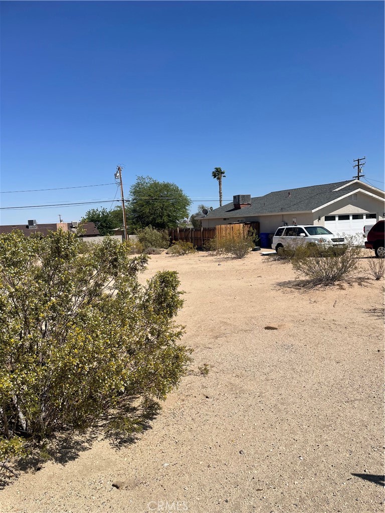 Wide infill lot between two houses, 5353 and 5373 Encelia, 29 Palms.
Quiet neighborhood, across from 29Palms Cemetery.
Buy now while prices are low!
