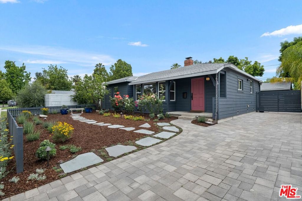 This charming, 3 bedroom/2 bath Traditional home is situated on a peaceful tree-lined street in the heart of Sherman Oaks. This property is conveniently situated close to Kester Elementary, an award-winning school. Freshly painted inside and out, this inviting home features large windows and newly refinished hardwood floors. The front facing living room includes a cozy reading nook, providing a comfortable space for relaxation. A den with exposed wood beams is also featured, and it offers access to the backyard. The kitchen has been recently renovated and boasts newer appliances, quartz countertops, marble backsplash and porcelain tile floors. It also includes a breakfast bar, making it a convenient area for quick meals. The laundry room is equipped with side-by-side washer and dryer. Large, finished garage includes a split HVAC unit, allowing for climate control, and its floor has been recently sealed. Additionally, there is a Tough Shed located behind the garage, providing extra storage space for your needs. The front yard has been newly landscaped with drought resistant plants, which are supported by a drip system. A stone pathway and bench contribute a modern touch while preserving the traditional charm of the home. The backyard is a stunning feature of the property, surrounded by fruit trees and mature landscaping that adds to the tranquility of the home. It is an ideal space for al-fresco dining and entertaining guests. Storage space is abundant throughout the house, ensuring you have plenty of room to organize your belongs. Other notable features include a tankless water heater and a water filtration system throughout the house. The location of this property is highly convenient, with Ventura Blvd, the 101 Fwy, and a wide array of shops, restaurants, parks and nightlife options just minutes away. Experience Sherman Oaks living at its best.