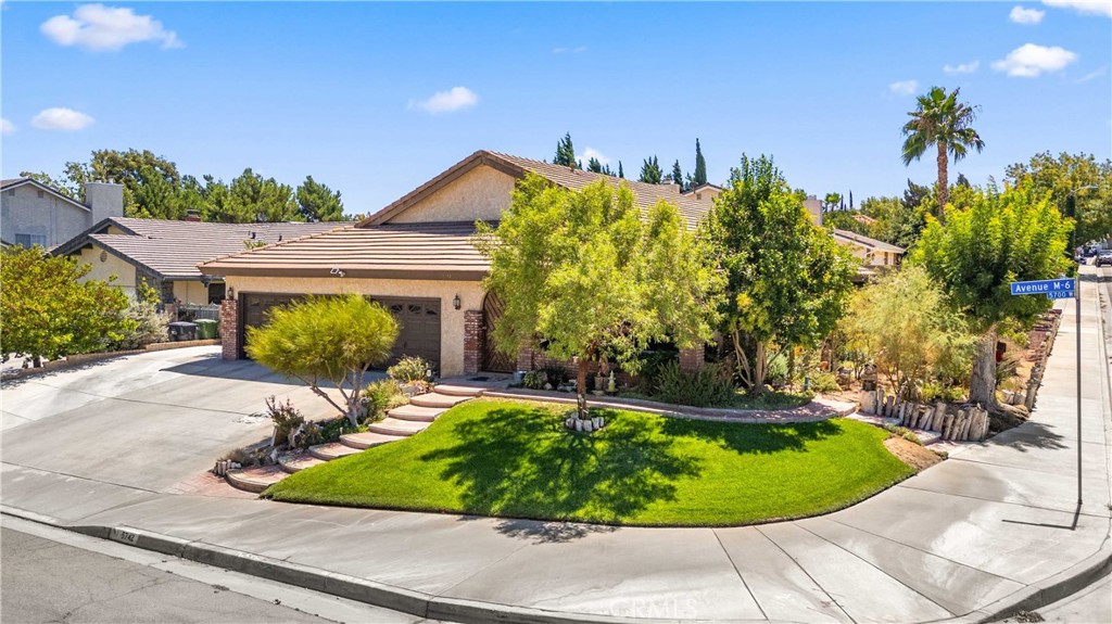 **Custom 4-Bedroom Home in Desirable Quartz Hill with Pool, Spa & Paid Solar**
Welcome to this maintained custom 4-bedroom, 2-bath home in the highly sought-after Quartz Hill neighborhood. A spacious 3-car garage opens into a convenient laundry room. The inviting living room features a cozy fireplace, while the comfortable family room offers the perfect space to relax or entertain. The kitchen boasts upgraded appliances, a reverse osmosis system, and large windows overlooking the lush, green backyard complete with a sparkling pool and spa—ideal for summer gatherings.
The 4th bedroom is a private upstairs loft, perfect for guests, a home office, or a peaceful retreat.
This home is loaded with updates, including:
Mechanical & Structural Upgrades: New water heater, new heating & air system with duct work (professionally maintained every 6 months), and a new roof on the patio and adjacent section of the house.
Energy & Efficiency: 22-panel PAID solar system, newly replaced pool pump, and upgraded sliding windows that pop out for easy cleaning.
Kitchen & Utility: Upgraded kitchen appliances, newly replaced garbage disposal, and bench in garage included.
Technology & Security: Ring alarm system at the front door and front of house, plus a new garage side wall opener controlled by phone app.
Additional perks include a beautifully landscaped backyard, a spacious patio for outdoor dining, and plenty of storage in the oversized garage. This Quartz Hill gem blends comfort, style, and efficiency, ready for you to move in and enjoy!