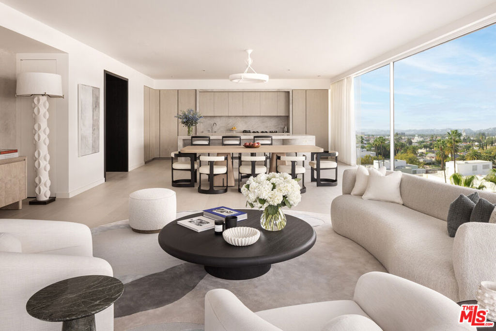 Residence 506 East is an expansive 2-Bedroom + Den/2.5 Bath Mandarin Oriental residence with a private north-facing and jaw-dropping views of the Hollywood Hills. Your home is accompanied by legendary Mandarin Oriental's five-star, around-the-clock service, and culinary experiences by Michelin-starred Chef and restaurateur Daniel Boulud. The custom-designed Molteni kitchen features leathered Taj Mahal quartzite curved countertops and backsplash, Tabu Birch wood cabinetry, & top-of-the-line Miele appliances. The luxurious en-suite primary bath boasts French vanilla marble walls and radiant heated floors, book matched Azul de Nordic marble vanities, freestanding Kaldewei soaking tubs, exquisite faucet fixtures by CEA Design, and wall-hung Toto water closets. This is life at its most effortless and extraordinary in one of the most coveted locations in the world. Spanning a full city block atop Beverly Hills' famed Golden Triangle, Mandarin Oriental Residences, Beverly Hills is comprised of 54 private homes infused with a lifestyle of unmatched, effortless sophistication. Mandarin Oriental Residences, Beverly Hills offers a dedicated concierge team, a private porte-cochre with 24-hour valet, a private garage with dedicated parking spaces, lush landscaping by Enzo Enea, a fireplace library and lounge, dedicated meeting room and over 12,000 square feet of resort-style rooftop amenities, including a 40' pool with cabanas, daybeds, and lounge chairs, residents-only spa with treatment rooms, steam room, sauna, and outdoor relaxation terrace, state-of-the-art Fitness Center equipped by Technogym, yoga studio and outdoor meditation terrace. Residents and their guests can enjoy Daniel Boulud's first- ever private dining concept, Boulud Priv, a full-floor indoor- outdoor restaurant and bar with sweeping views. A dedicated concierge team is on hand to cater to your every wish. Welcome to your own private Mandarin Oriental residence.