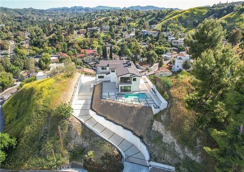 Photo of 5099 Llano Drive, Woodland Hills, CA 91364 (MLS # SR25103066) Photo of 5099 Llano Drive, Woodland Hills, CA 91364 (MLS # SR25103066)