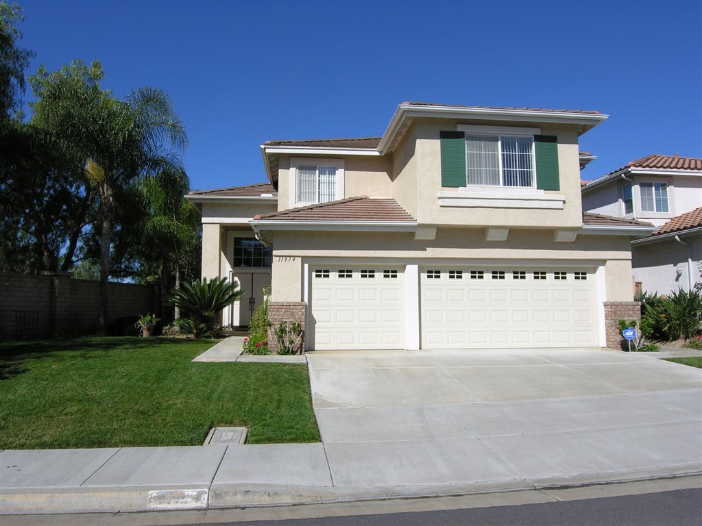 Mountain/Parklike Views home with open floor plan. High ceiling in living room & dining room offers open feeling. Tons of natural light. Popular 4 bedroom plus a loft, One bedroom/one bath downstairs. Upstairs loft is perfect for 2nd family room or office. Gourmet kitchen with a island. Breakfast nook area. Private backyard with covered patio and matured fruit trees. Award winning Poway Unified School District. Very convenient location. Easy access to freeway. Close to all. Neighborhoods: Hillsborough View: Parklike Sewer: Sewer Connected