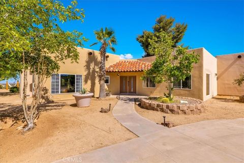 Photo of 55183 Cooper Lane, Yucca Valley, CA 92284 (MLS # JT26094462)