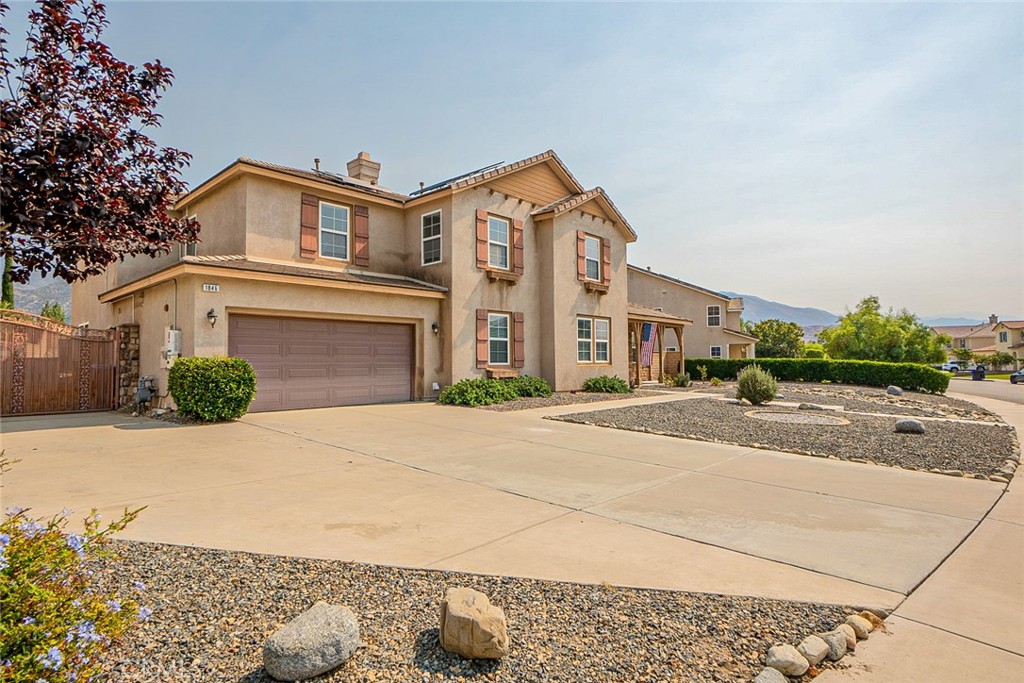 Completely renovated upscale pool estate located in NorthEnd San Bernardino’s University Park, just steps from Cal State San Bernardino! This stunning 5-bedroom, 4-bathroom home spans nearly 4,000 sq ft of open-concept living on an oversized 16,000+ sq ft lot—the largest in the community. Enjoy ultimate privacy with no rear neighbors and breathtaking mountain views. The thoughtfully designed interior features a grand wrought iron staircase and a spacious family room with a cozy fireplace that flows into the gourmet kitchen, equipped with a massive center island, walk-in pantry, gas cooktop, and abundant cabinet space—perfect for gatherings and entertaining. The first floor offers a formal dining room, formal living room (optional 6th bedroom), a guest suite with a full bath, and an indoor laundry room. Upstairs, the luxurious primary suite boasts a dual-sided fireplace, coffee bar, spa-like bathroom with soaking tub, walk-in shower, dual vanities, private toilet room, and his & hers walk-in closets. Three additional bedrooms and two full bathrooms—one ensuite—complete the upper level. Step outside to your resort-style backyard with a sparkling pool and spa, full-court basketball area, fresh landscaping, and approximately 2,800 sq ft of pavers. The oversized side yard with double gate access is ideal for RV parking. Additional features include fire sprinklers throughout, two gas fireplaces, 3-car garage, and full block wall fencing. This move-in ready showpiece offers a rare combination of size, upgrades, and location—within walking distance to Cal State San Bernardino, with panoramic views of the mountains and paragliders soaring above. A true entertainer’s paradise and a private retreat, this home is a must-see!