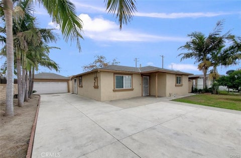 Photo of 7712 Santa Gertrudes Avenue, Stanton, CA 90680 (MLS # PW26194918)